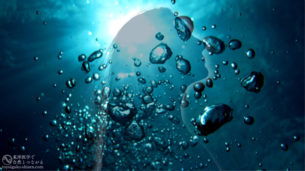 春分の天人合一。「体の中の撹拌」のイメージ。深海と女性シルエットの二重露光
